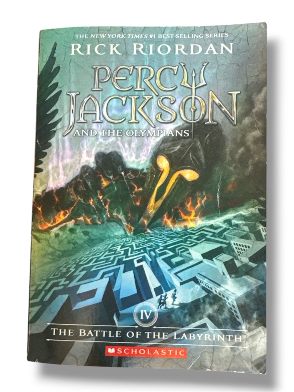 Scholastic Blue Paperback with Gold Title Accent